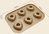 ถาดอบโดนัท ขนมปัง ขนมไข่ มาเดอลีน แมเดลีน Madeleine เจาะรูตรงกลาง รูปหัวใจ 6 หลุม ถาดอบโดนัท ขนมปัง ขนมไข่ มาเดอลีน แมเดลีน Madeleine เจาะรูตรงกลาง รูปหัวใจ 6 หลุม - อุปกรณ์เบเกอรี่