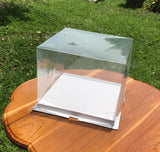 กล่องโชว์เค้ก สำหรับเค้ก 2 ปอนด์ 10 นิ้ว แบบใส ฐานขาว PVC 1 กล่อง ฐาน 26x26 ซม. สูง 17 ซม กล่องโชว์เค้ก สำหรับเค้ก 2 ปอนด์ 10 นิ้ว แบบใส ฐานขาว PVC 1 กล่อง ฐาน 26x26 ซม. สูง 17 ซม - อุปกรณ์เบเกอรี่